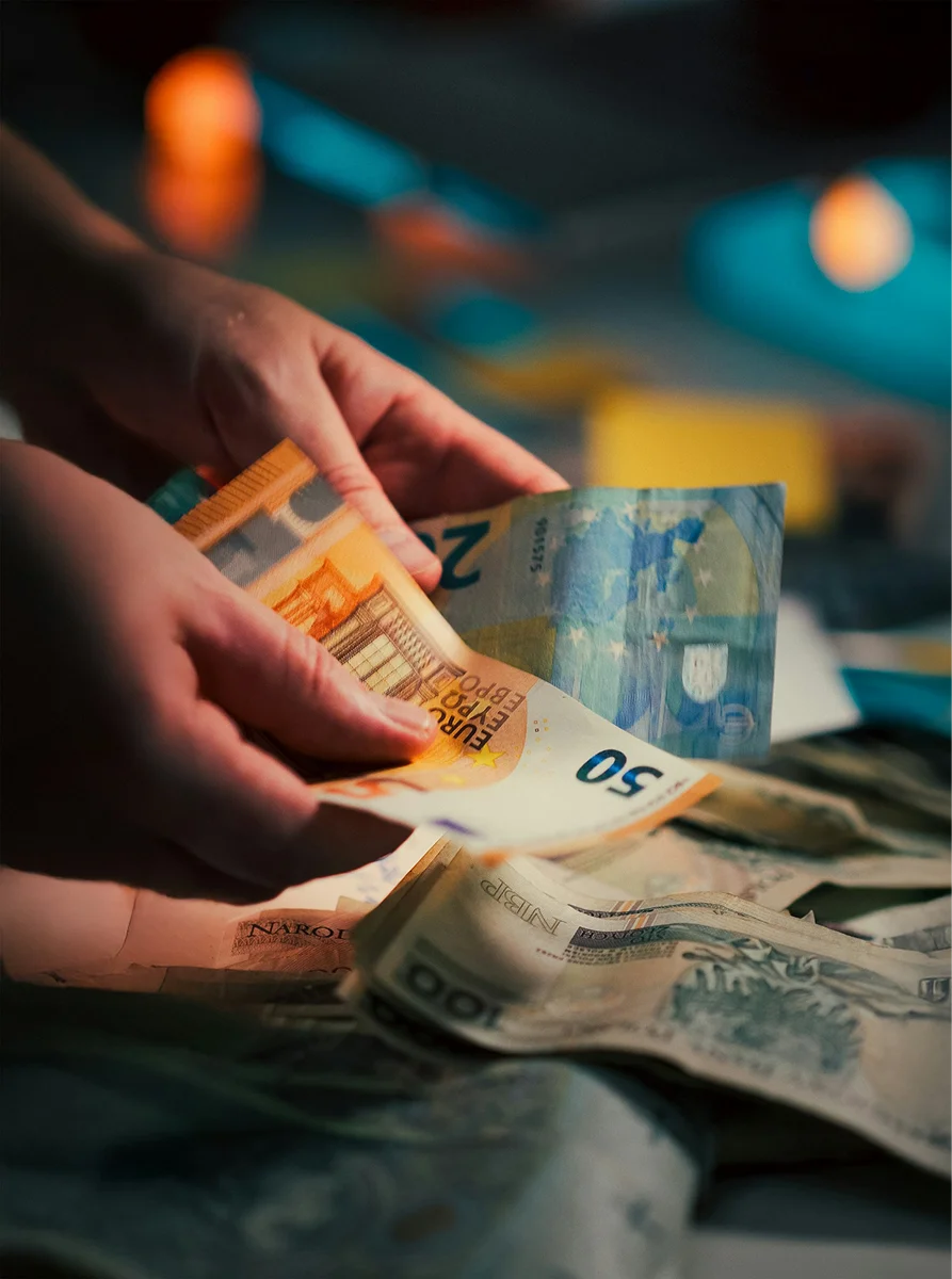 Teller assisting a customer at an FX counter