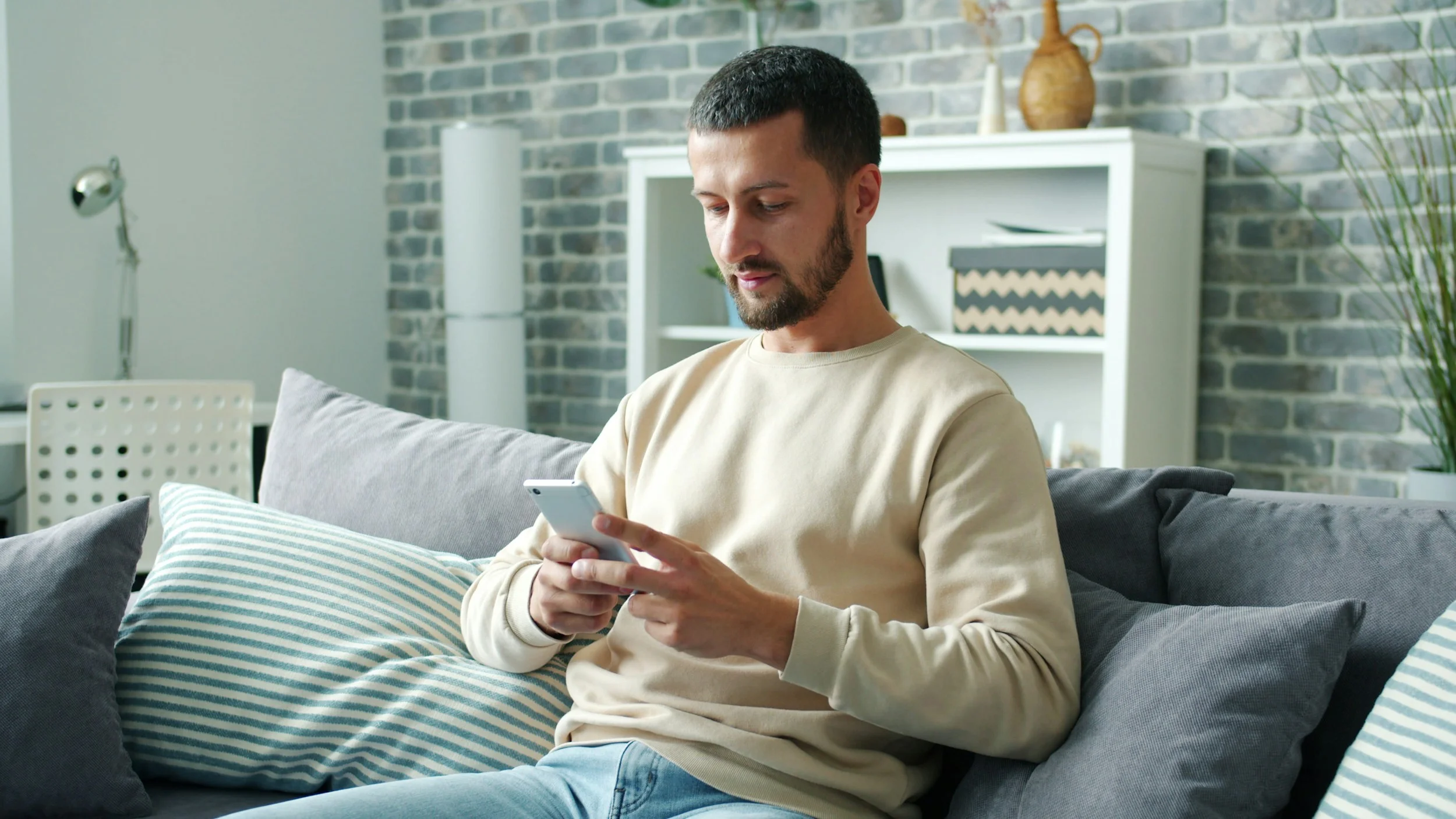 Person using mobile wallet at home